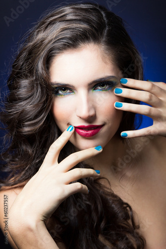 Sexy Beauty Girl with Red Lips and blue Nails