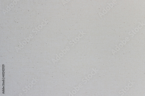 Background from white coarse canvas texture. Clean background. © madredus