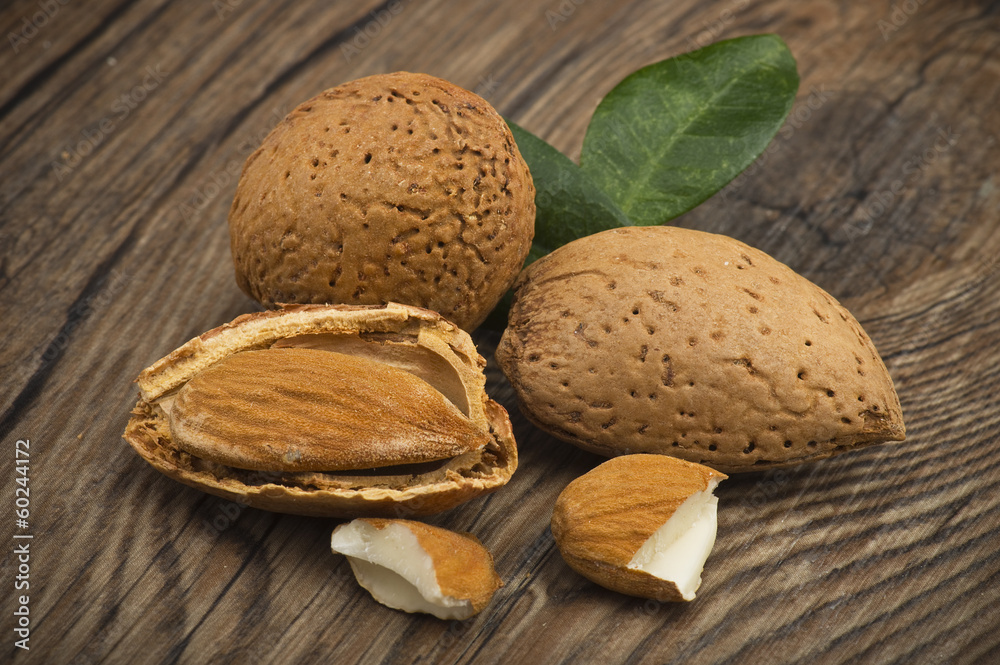 Almonds group close up on the wood table Almonds group close up on the wood table