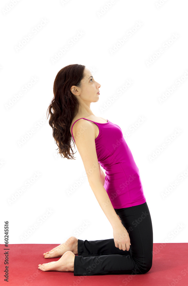 Woman strengthening the upper leg muscles Woman strengthening the upper leg muscles