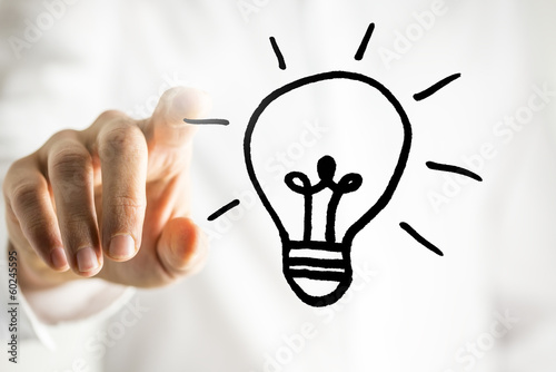 Man with a bright idea - a light bulb