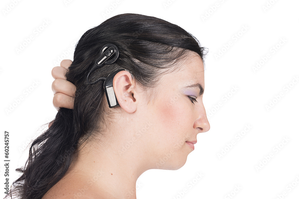 Naklejka premium young deaf or hearing impaired woman with cochlear implant