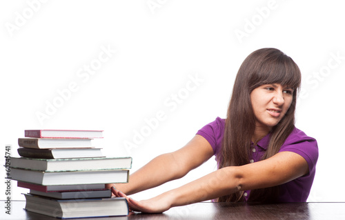 girl pushing books