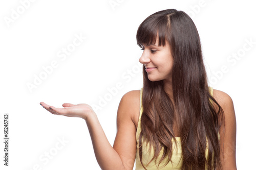 girl pointing at empty space