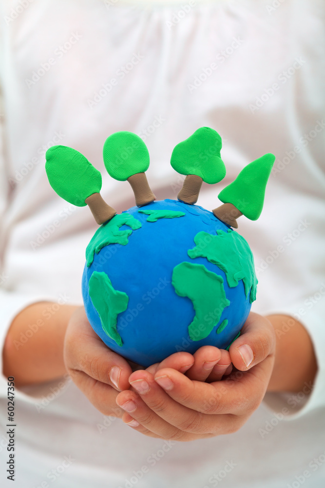 Ecology and environment concept with trees on clay world Ecology and environment concept with trees on clay world