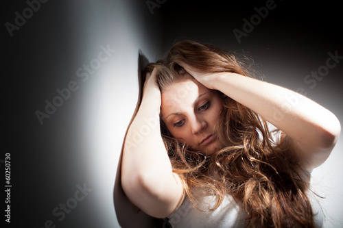 Young woman suffering from a severe depression, anxiety