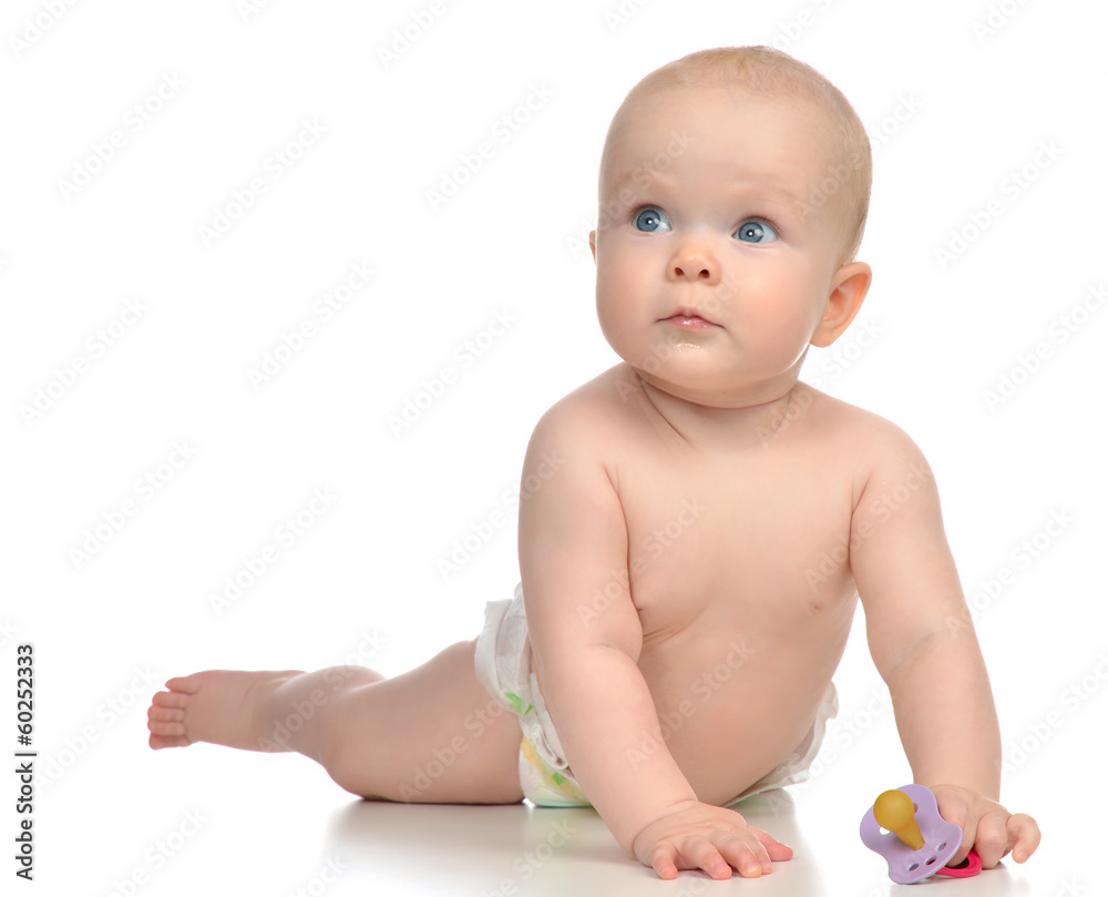 Infant child girl lying happy holding baby nipple soother Infant child girl lying happy holding baby nipple soother