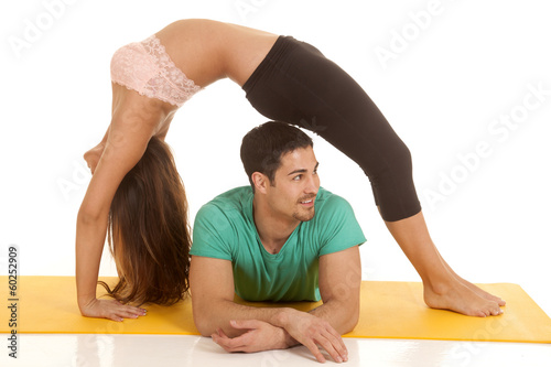fitness couple backbend over him look side