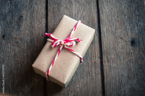 Gift box on wooden background