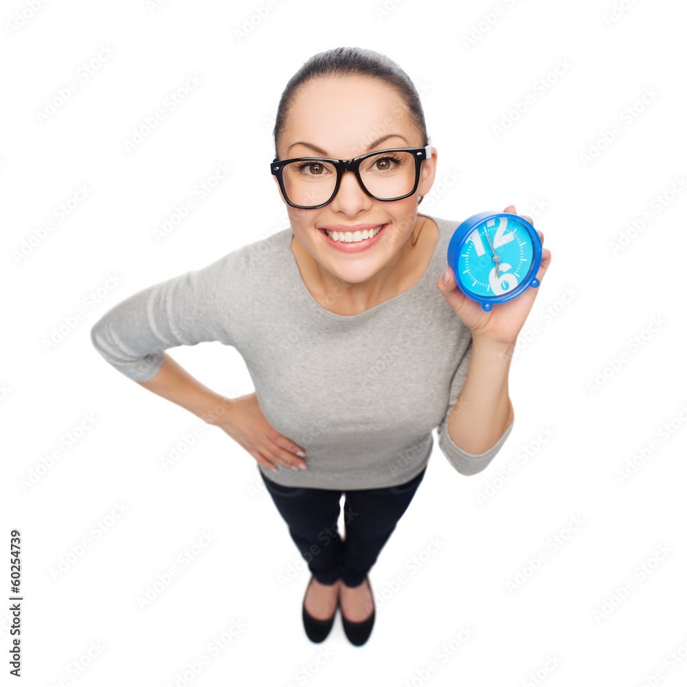 smiling woman in eyeglasses with blue clock smiling woman in eyeglasses with blue clock