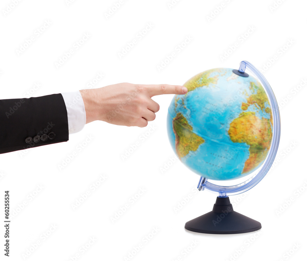 businessman pointing finger to earth globe businessman pointing finger to earth globe
