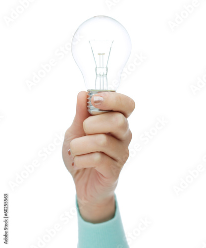 close up of woman hand holding light bulb