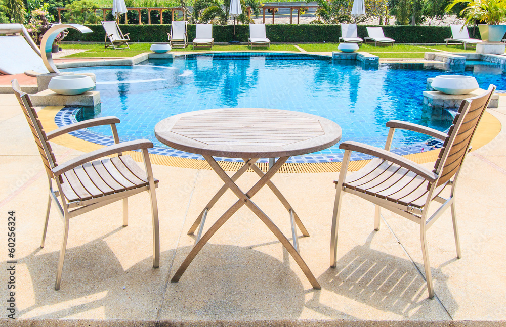 Table and chairs at the pool