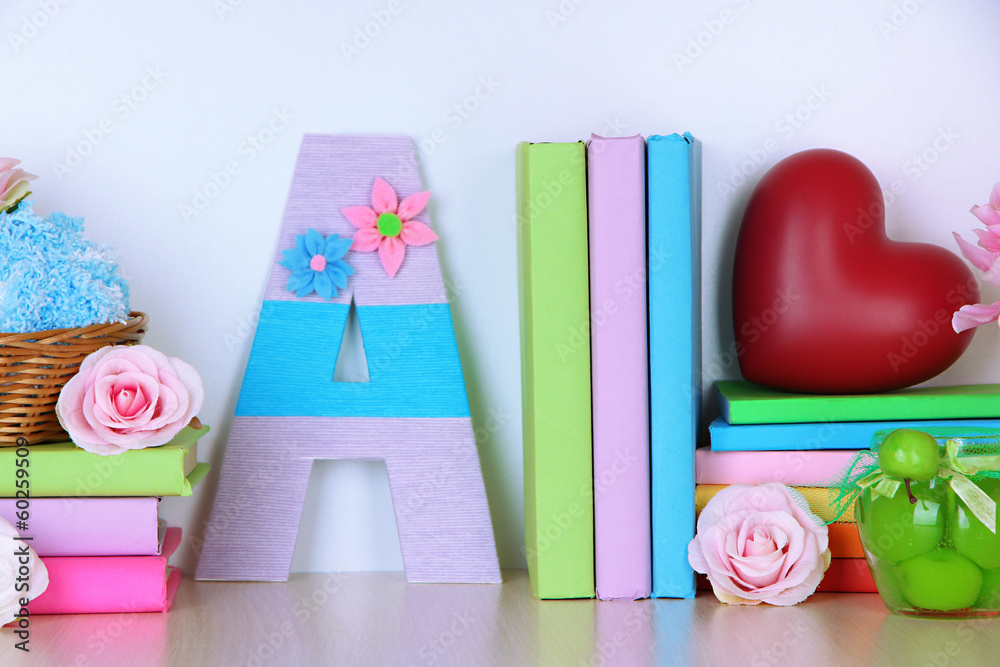 Shelf decorated with handmade knit letter Shelf decorated with handmade knit letter