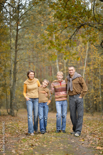 family of four standing