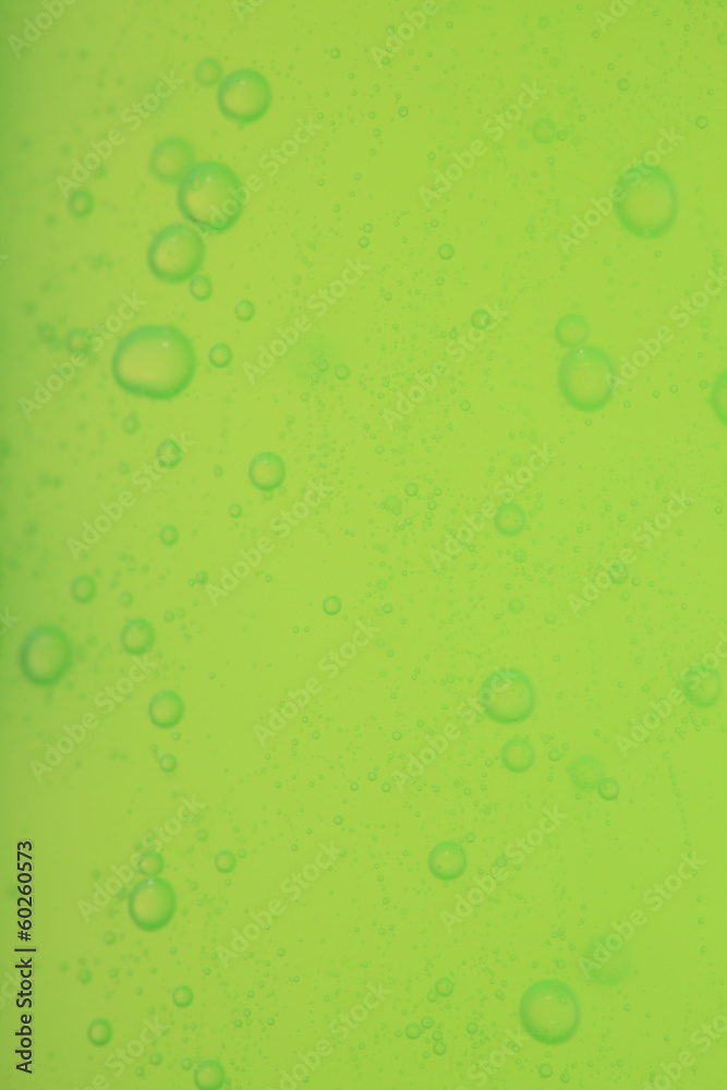 soap bubbles green liquid background