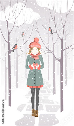 Girl carrying a gift box