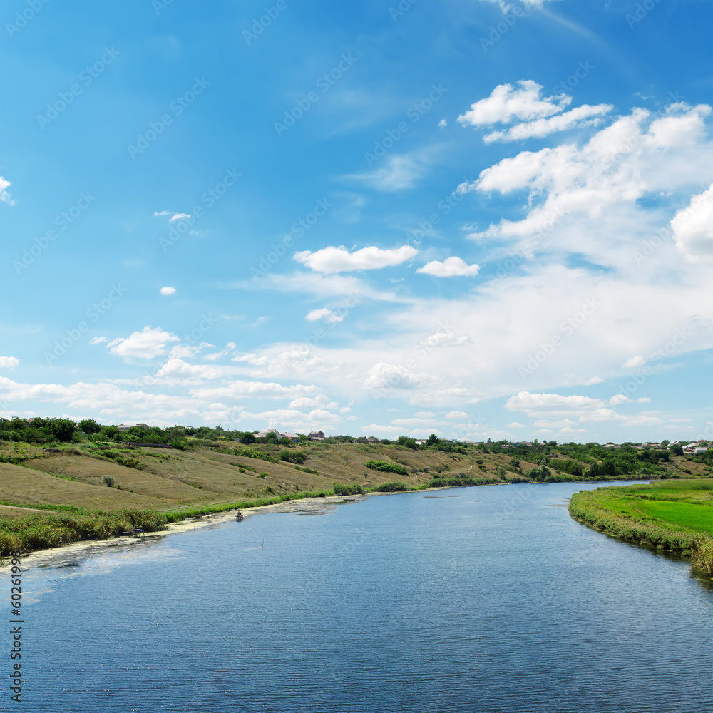 view to river and clouds in blue sky