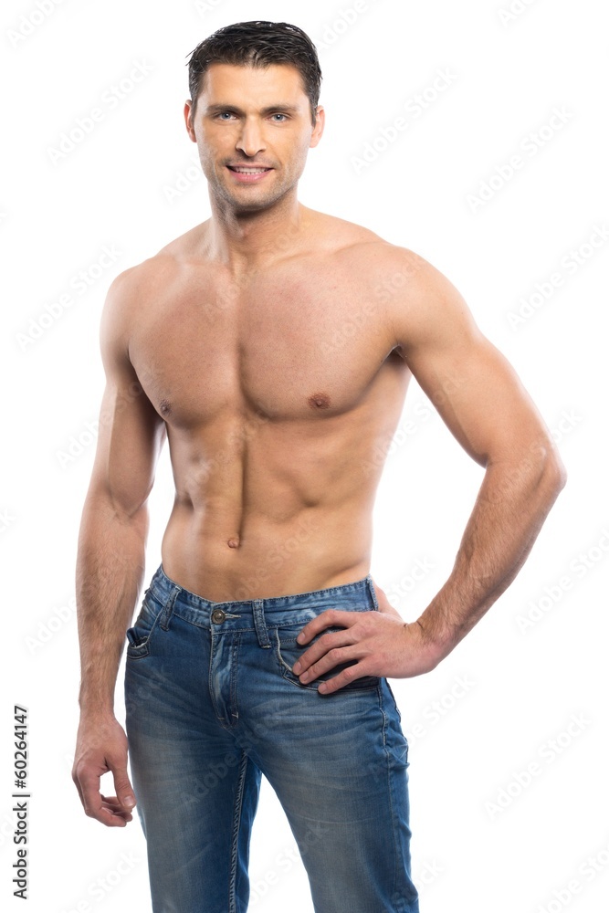 Handsome young man in blue jeans with naked torso Handsome young man in blue jeans with naked torso