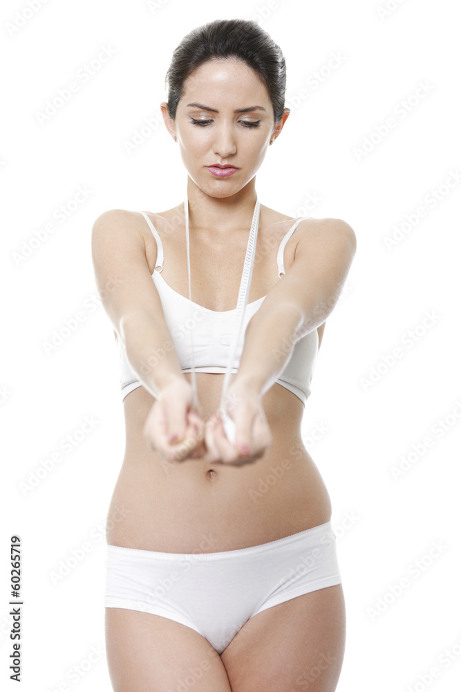 Woman holding tape measure Woman holding tape measure