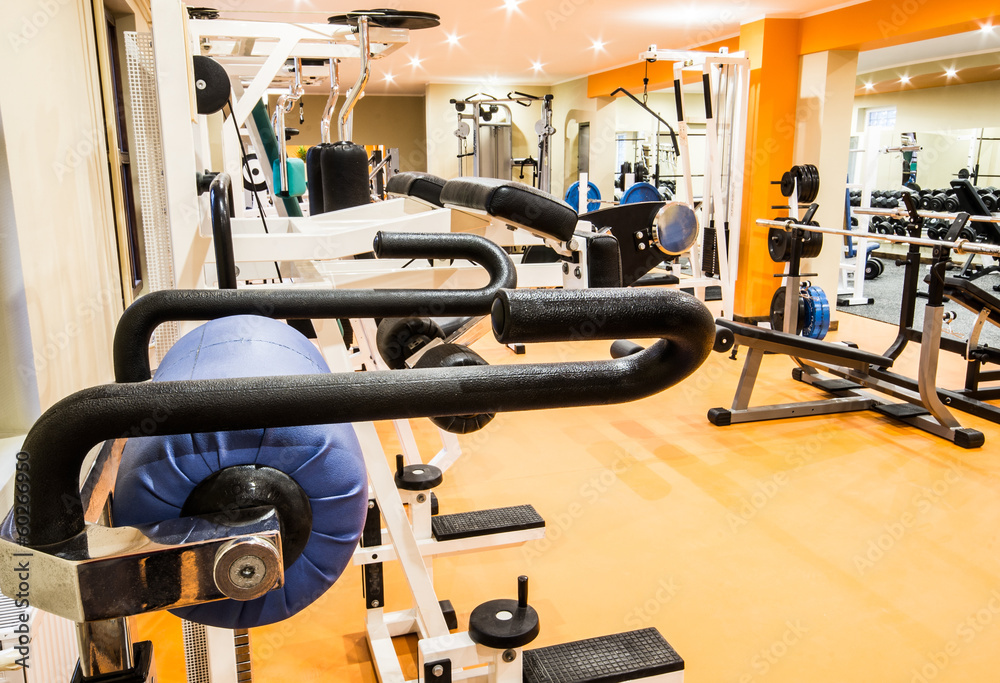 Interior view of a gym with equipment. Interior view of a gym with equipment.