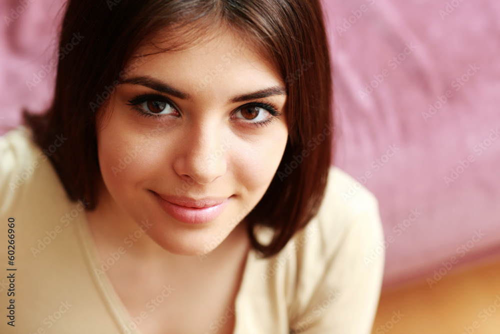 Closeup portrait of a young happy woman at home Closeup portrait of a young happy woman at home