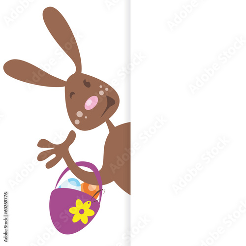 waving easter bunny with easter basket and eggs