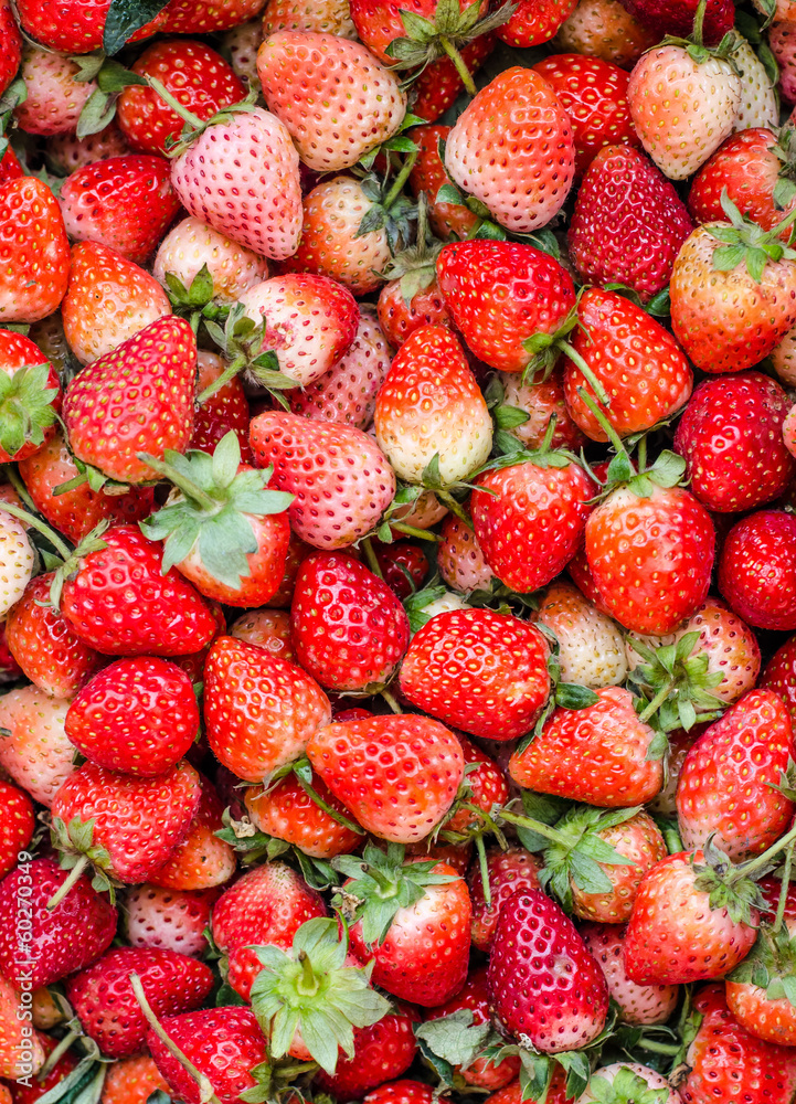 Fresh natural juicy strawberries to background on the street mar Fresh natural juicy strawberries to background on the street mar
