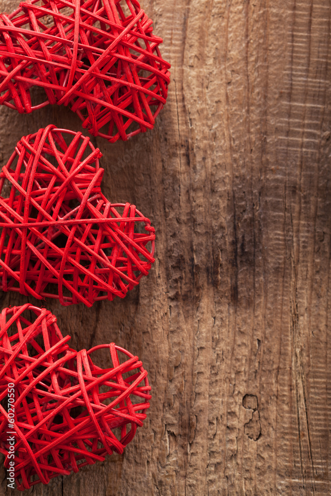 red hearts over wooden background for Valentines day red hearts over wooden background for Valentines day
