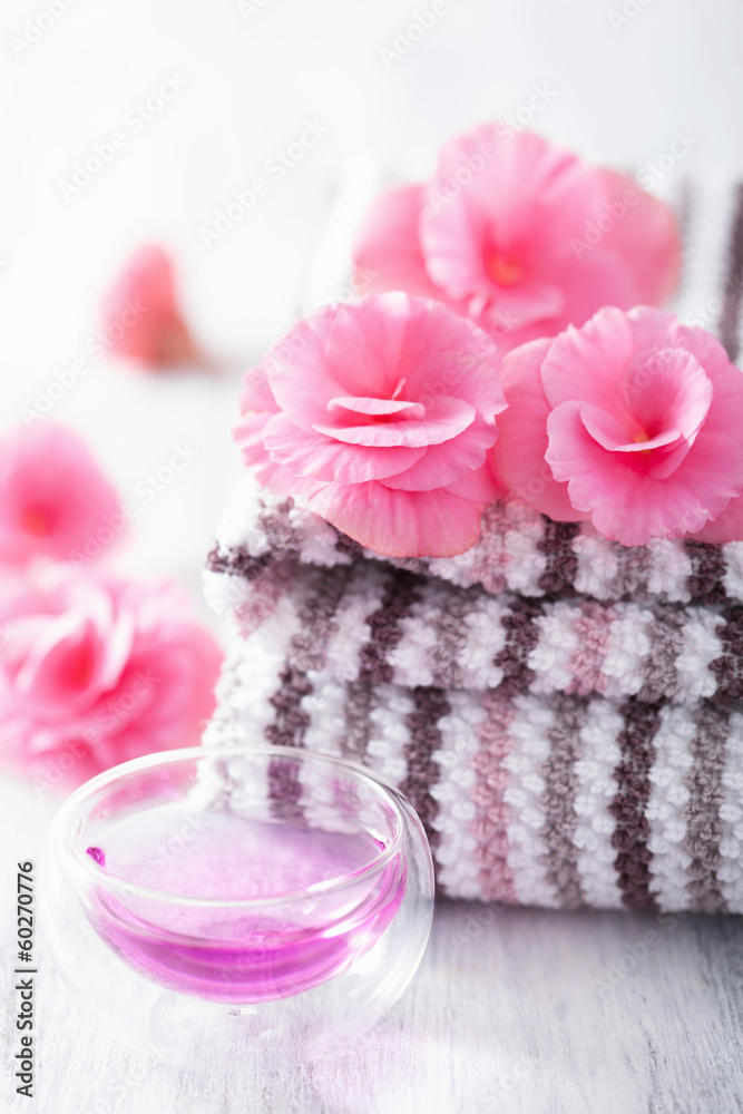 spa set with begonia flowers and essential oil spa set with begonia flowers and essential oil