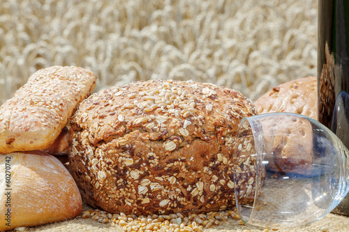 Bread and wine glass in front of the cereal box