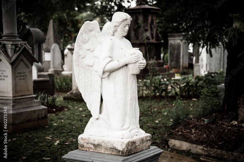 Statue of angel in old cemetery Museum Prasasti Statue of angel in old cemetery Museum Prasasti