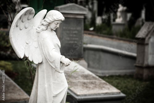 Statue of angel in old cemetery Museum Prasasti photo