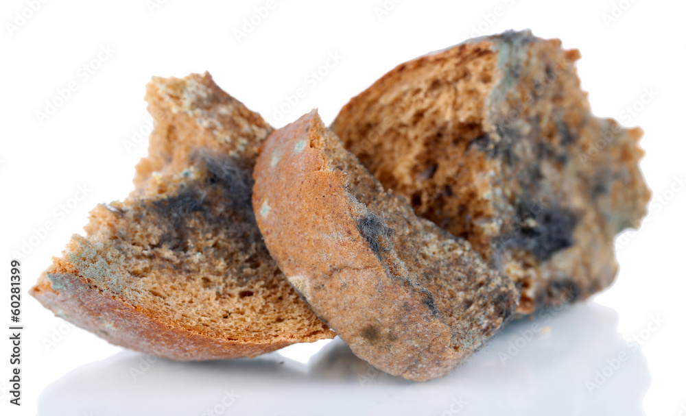 Mouldy rye bread, isolated on white