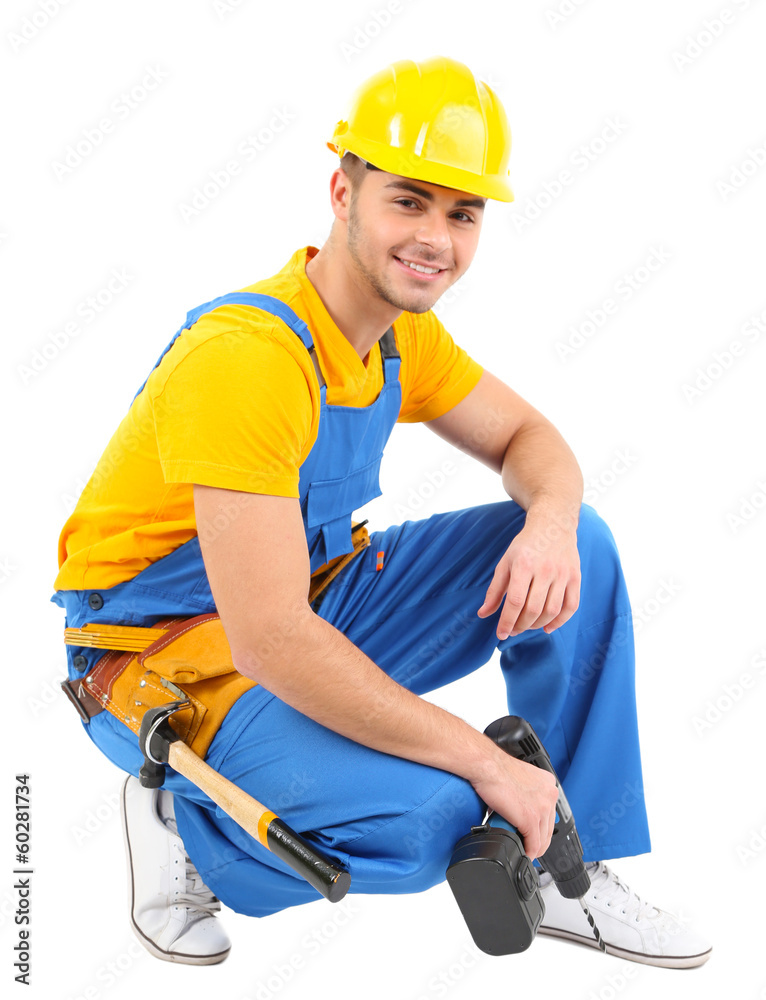 Male builder in yellow helmet isolated on white Male builder in yellow helmet isolated on white