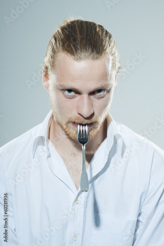 humorous man with fork photo