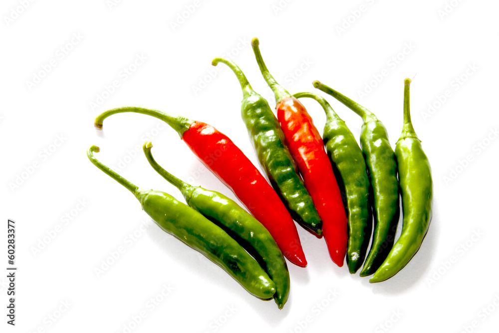 Isolated Arrangement Of Two Red And Six Green Chillies Isolated Arrangement Of Two Red And Six Green Chillies