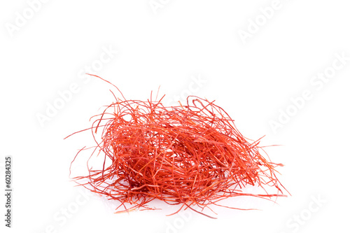 red  chili filaments on a withe background