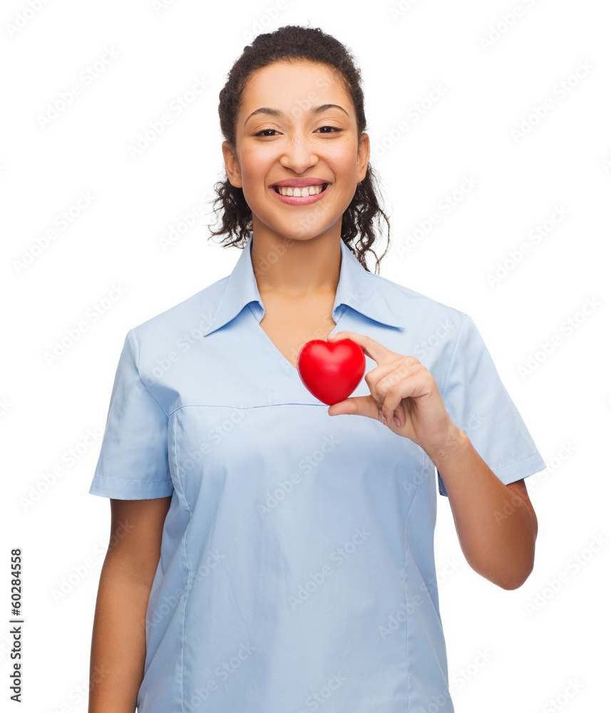smiling female doctor or nurse with heart smiling female doctor or nurse with heart