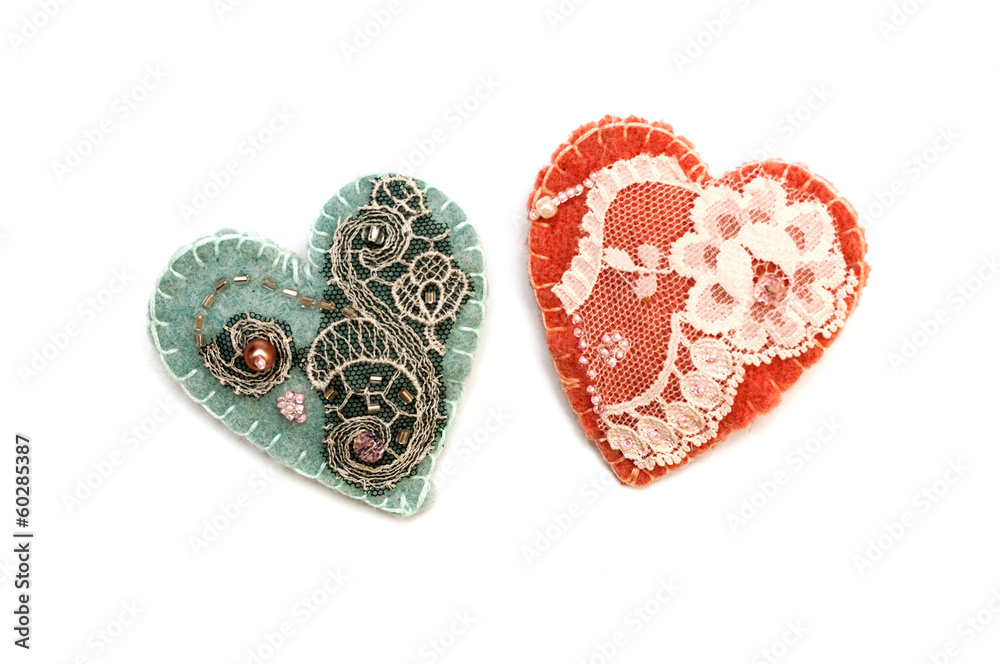 handmade textile heart on a white background handmade textile heart on a white background