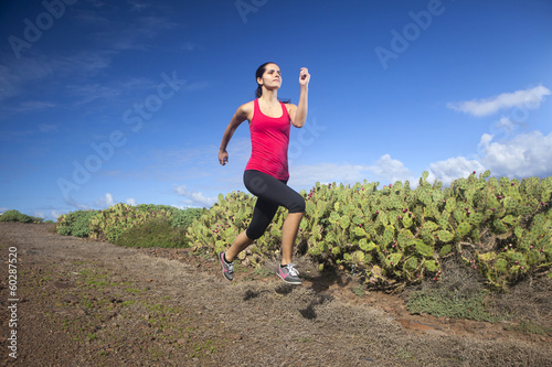 athlete woman running in nature. Healthy active lifestyle young