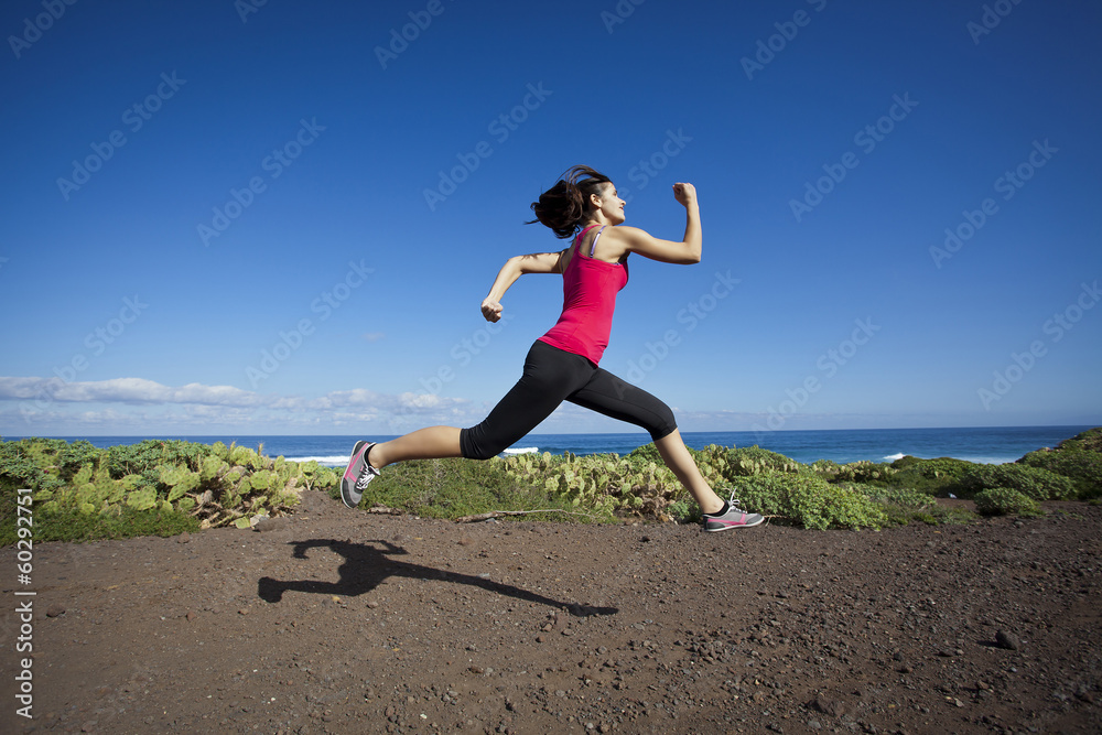 athlete woman running in nature. Healthy active lifestyle young athlete woman running in nature. Healthy active lifestyle young