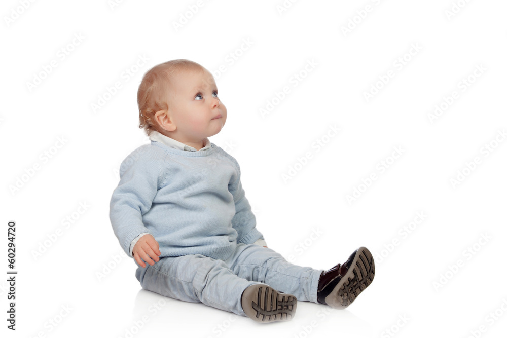 Adorable blonde baby sit on the floor Adorable blonde baby sit on the floor