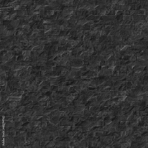 Black slate-tiled wall