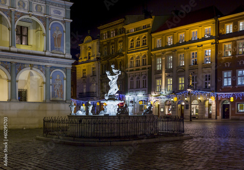 Fragment of  historical town square in Poznan, Poland with a fou