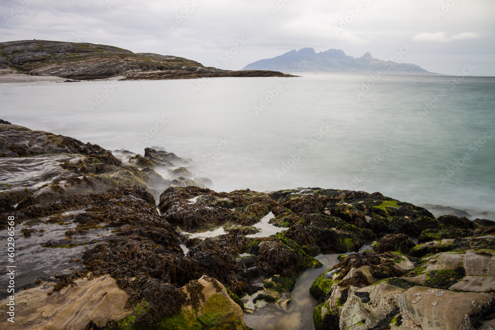Long exposure shot of rocks and waves in Northern Norway