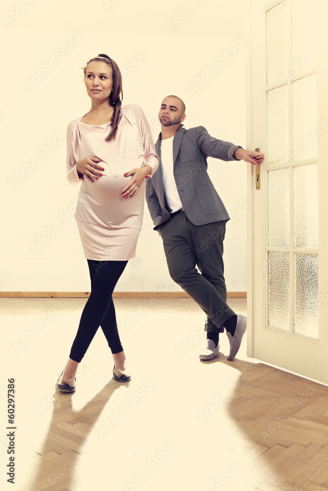 Loving couple in empty house