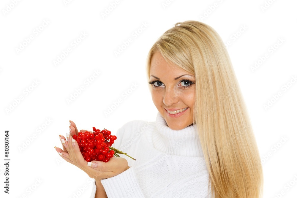 Young woman with a handful of berries. Young woman with a handful of berries.