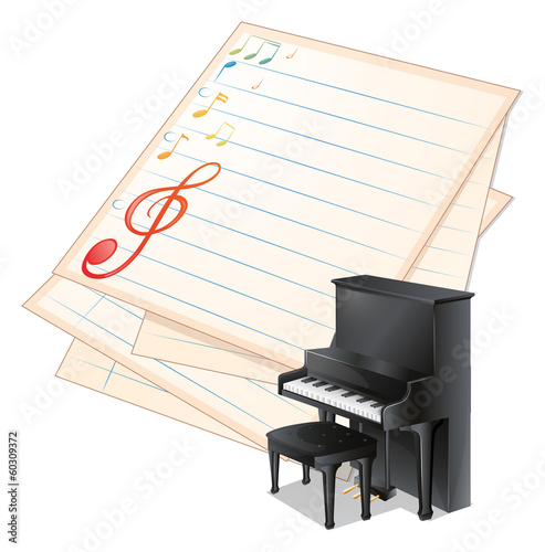 An empty paper with musical notes beside a piano