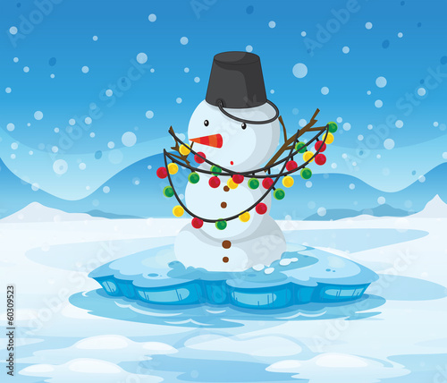 A snowman above an iceberg with a pail above its head